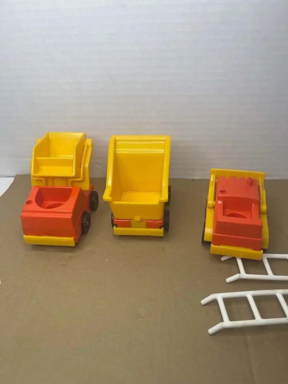 Vintage Fisher-Price Little People Construction Lot with Dump Trucks and Figures